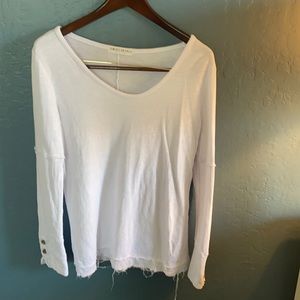 White long sleeve cotton shirt.